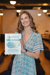 Dr Kaitlin Holding The Somatic Workbook